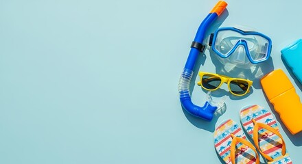Summer Beach Accessories Lay Flat on Blue Background with Copy Space
