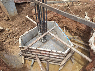 Triangular foundation formwork ready for pouring concrete with pile deviation.  Pile Footing. Deep Foundation.