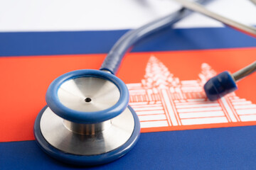 Stethoscope on Cambodia flag background, Business and finance.