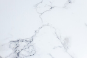 Close Up Of Polished White Marble Surface With Delicate Grey Veins