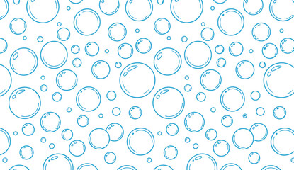 Simple and fun seamless pattern of blue soap bubbles on white background
