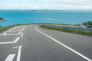 Fototapeta premium Downhill Road with Ocean View in Teshima, Setouchi, Japan