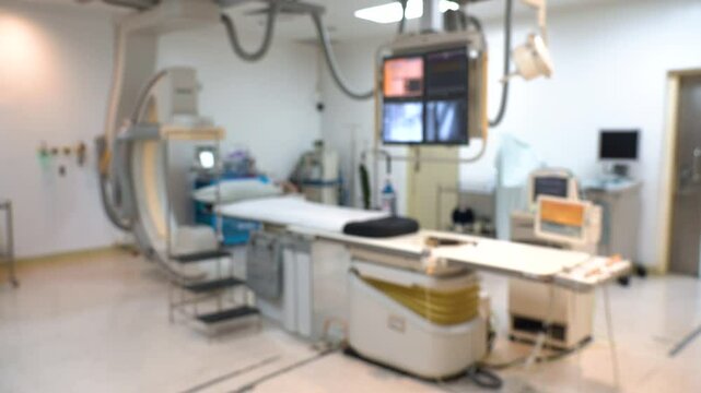 Blurred of catheterization laboratory or Cath Lab in a hospital or clinic with diagnostic imaging equipment used to visualize the heart arteries and also surgical operations.