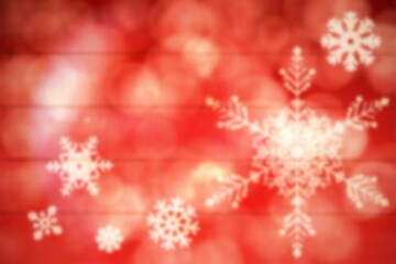 Blurred snowflakes on planks