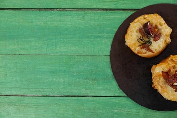 Fresh food on green wooden table