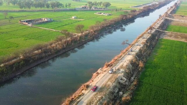 Aerial view of BRB Canal and green fields, Pakistan.