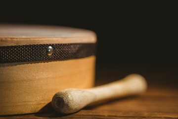 Close-up of wooden stick by bodhran