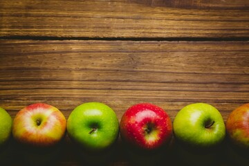 Red and green apples on table © vectorfusionart