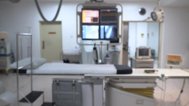 Blurred of catheterization laboratory or Cath Lab in a hospital or clinic with diagnostic imaging equipment used to visualize the heart arteries and also surgical operations.