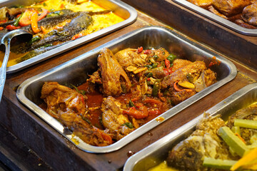 Traditional Indonesian Food, captured on July 10, 2025. Authentic dishes made with local spices, served with rice, meats, vegetables, and sambal for rich flavor.