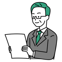 書類を見る中年のスーツの男性