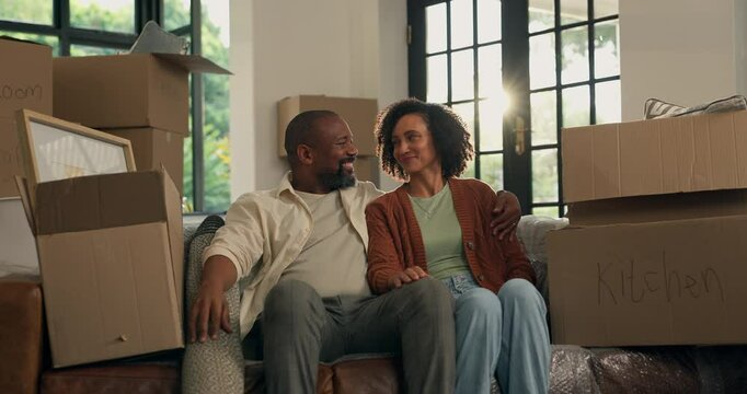 Happy, black couple and planning with boxes in new home for renovation, interior decor or furniture. Mature man, woman or discussion with packages for relocation, move or property investment in house