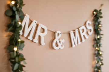 Close up of "Mr & Mrs" wedding garland. Romantic wedding decoration detail.
