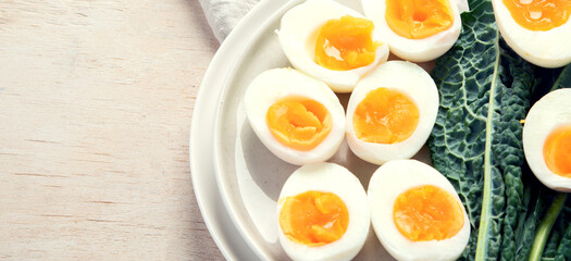 Plate with halves of delicious boiled eggs.