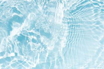 Blue water with ripples on the surface. Defocus blurred transparent blue colored clear calm water...