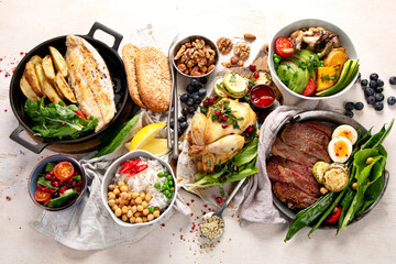 Family dinner table. Table full of homemade food.
