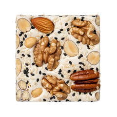Classic candy nougat featuring nuts and sesame, set against a white backdrop. A top view, flat lay, and close-up shot.