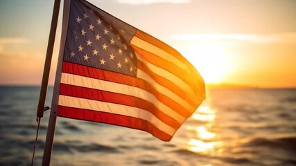 American flag waving at sunset over the ocean - Powered by Adobe