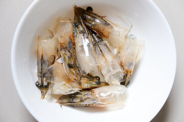 Close up of shrimps head part in a white bowl