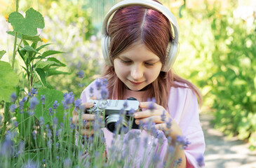 Young girl exploring nature with vintage camera