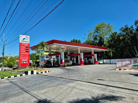 Indonesian gas station or indonesian called it SPBU (Stasiun Pengisian Bahan Bakar Umum) or Pom Bensin. Fuel filling station. Pamekasan, Indonesia - Jul 09, 2025.