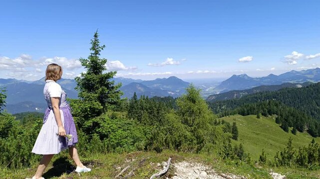 Explore Tyrolian traditions and vibrant dirndl dress against the backdrop of majestic Austrian mountains
