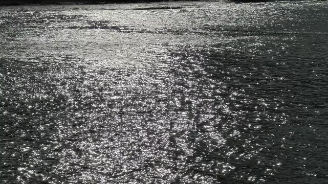 Dancing light on water surface in the harbour at Kalk Bay, near Cape Town.