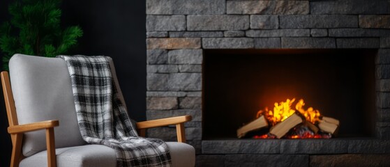 Obraz premium Cozy Chair by Stone Fireplace with Warm Flames and Soft Blanket in Modern Living Room Ambiance