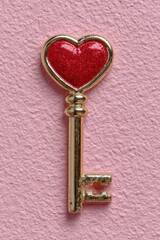 Magical golden key with red heart-shaped top designed for unlocking secrets and memories. Valentine's Day