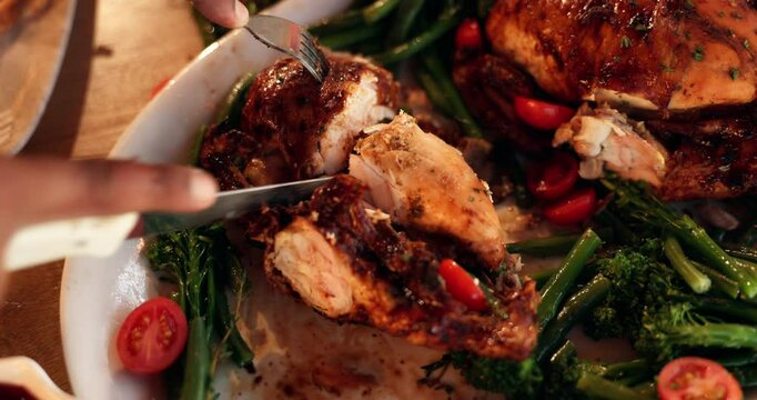 Cutting, chicken and hands with meal for thanksgiving, eating and person with healthy food in house. Above, meat and cuisine for festive season, celebration and dinner for Christmas in home or plate