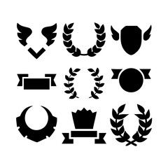 elegant laurel wreaths, shields, wings, and ribbon vector set.black-and-white vector pack of wreaths, shields, banners, and wings .Collection of six heraldic emblems with shields laurels helmet.
