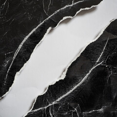 The old black paper was evenly torn on the diagonal with white space in between
