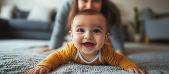 Joyful baby's first tummy time adventure on a textured blanket indoors