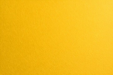 Close up of a solid yellow background with slight texture variations , texture of yellow paper
