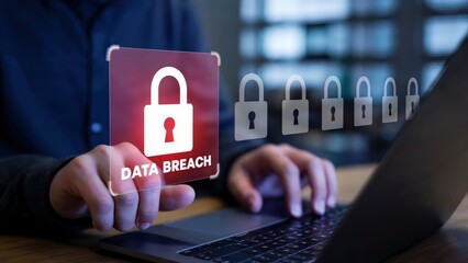 Cyber security threat detected as data breach with digital lock icon shows laptop computer concept.