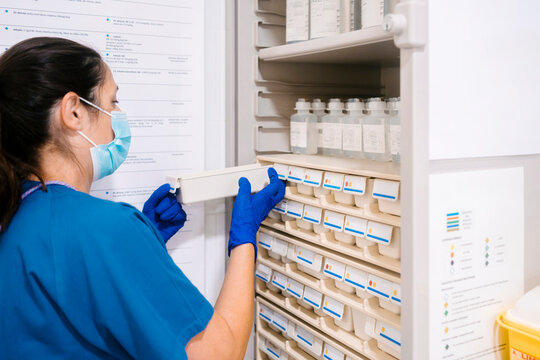 Mature nurse taking inventory at hospital