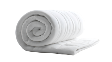 A rolled up white blanket or comforter with a portion unrolled on a black background in a studio shot