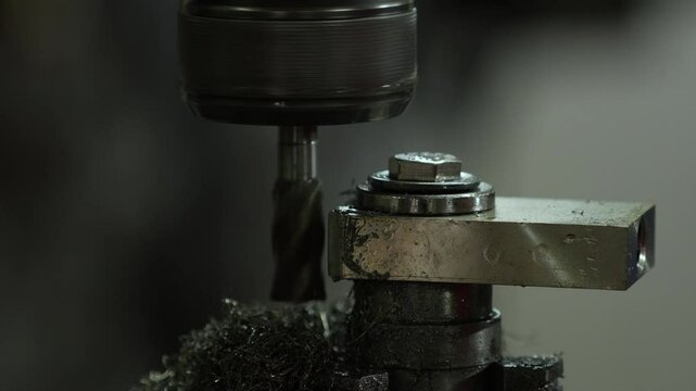 VDO 4K Lathe is working on turning metal parts for industrial use.