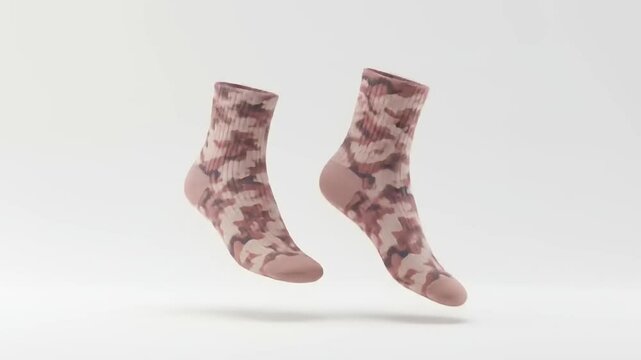 Stylish pink camo socks displayed in a minimalist setting, showcasing their unique design and texture