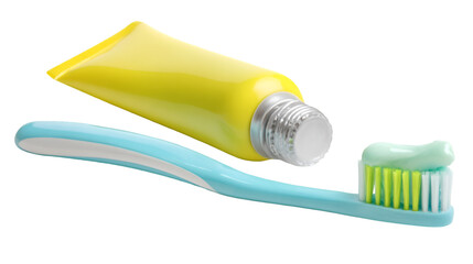 A yellow toothpaste tube with a blue toothbrush and toothpaste on the bristles close up shot isolated