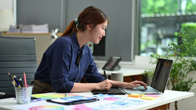 UX UI designer planning mobile layout with sticky notes in modern office. Creative brainstorming and prototyping workflow.
