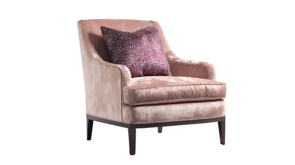Close up of a light pink armchair with a patterned pillow against a black background in a studio setting