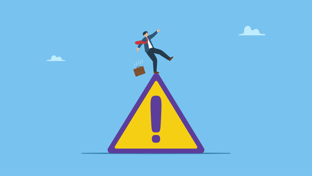 Businessman slip falling on exclamation symbol beware, careful caution sign. Symbolizes mistake caution, business risk or problem warning, failure prevention or avoid danger.