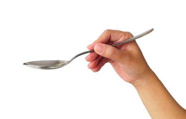 hand holding metal spoon on white