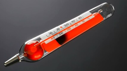 Glass thermometer measuring high temperature, red liquid inside - Powered by Adobe