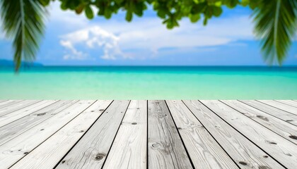 Fototapeta premium Tropical Beach View From Wooden Deck With Green Palm Leaves Turquoise Ocean Soft Sky And Sunlight In Relaxed Summer Mood