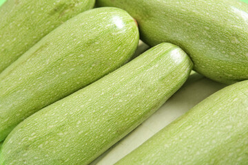 Fresh green zucchini as background