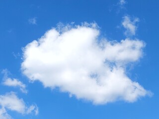 Blue sky landscape background with white clouds in summer. Blue sky with clouds. Soft white clouds...