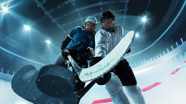 Dramatic close-up of two hockey players vying for puck control with intense determination on 3D ice rink. Concept of professional sports, fast-paced competition, skill and control - Powered by Adobe