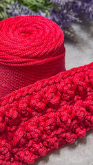 Pattern for knitting a bag. Crocheted from polyester cord. On a gray background